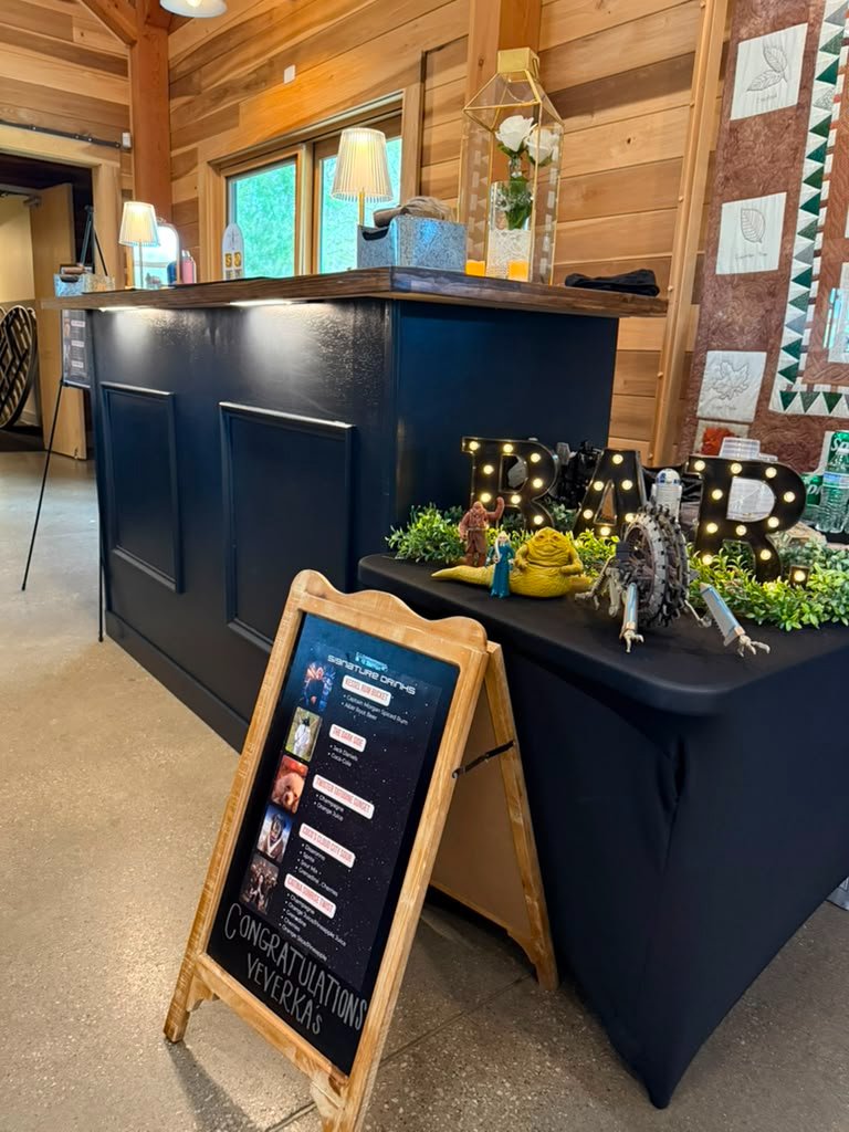 Three signature mocktails displayed with lavender lantern
